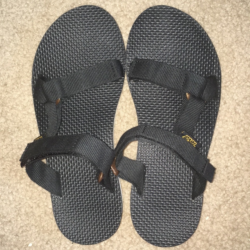 Teva black universal slide size 7